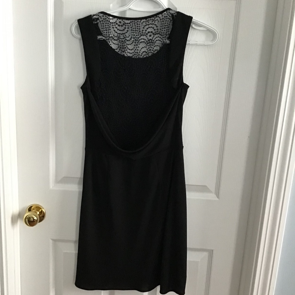 Lace back black cocktail dress